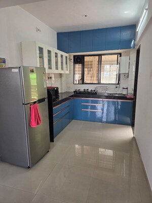 Kitchen in 2 BHK Apartment at Satyam Serenity, Wadgaon Sheri – for Rent