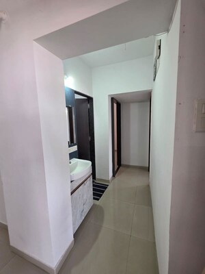 Building Lobby in 2 BHK Apartment at Satyam Serenity, Wadgaon Sheri – for Rent