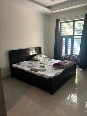 Bedroom in 3 BHK Builder Floor at Sushant Lok I – for Rent