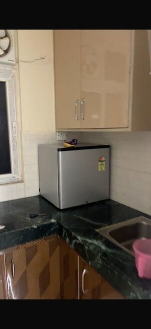 Kitchen in 1 BHK Apartment at Shree Vardhman Green Court, Sector 90 – for Rent