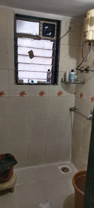 Bathroom in 1 BHK Apartment at Kshitija Shree Laxmi Residency, Byculla West – for Rent