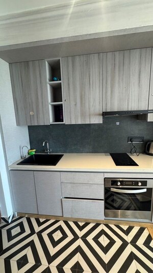 Kitchen in 2 BHK Apartment at Panchsheel Greens II, Sector 16 Greater Noida – for Rent