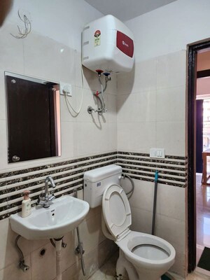 Bathroom in 2 BHK Apartment at Shree Vardhman Green Court, Sector 90 – for Rent