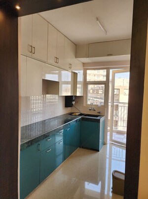 Kitchen in 2 BHK Apartment at Shree Vardhman Green Court, Sector 90 – for Rent