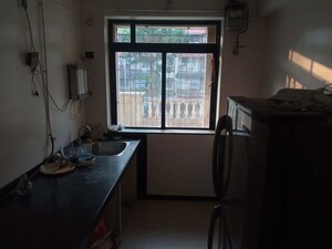 Kitchen in 1 BHK Apartment at Sheth Vasant Pride, Kandivali East – for Sale