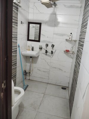 Bathroom in 3 BHK Apartment at Rohini – for Sale