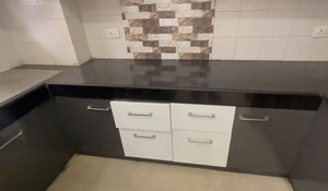 Kitchen in 2 BHK Apartment at Aditya Celebrity Homes, Sector 76 – for Sale