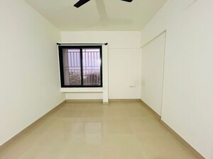Bedroom in 2 BHK Apartment at Ganesh Nakshatram, Dhayari – for Sale