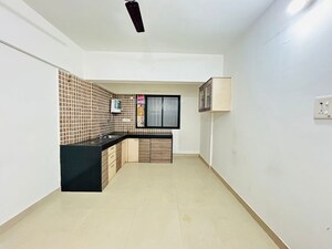 Kitchen in 2 BHK Apartment at Ganesh Nakshatram, Dhayari – for Sale