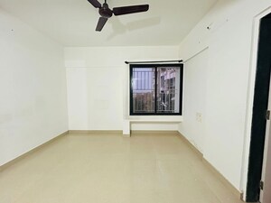 Bedroom in 2 BHK Apartment at Ganesh Nakshatram, Dhayari – for Sale