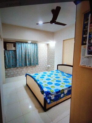 Bedroom in 1 BHK Apartment at Badrivishal Building, Dahisar East – for Rent