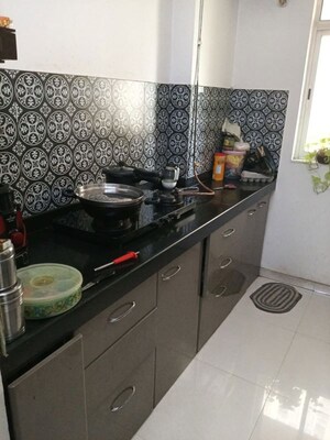 Kitchen in 1 BHK Apartment at Lodha Amara, Kolshet Road – for Sale