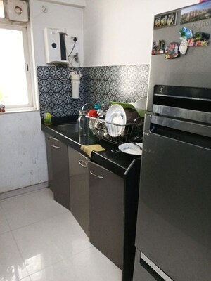 Kitchen in 1 BHK Apartment at Lodha Amara, Kolshet Road – for Sale