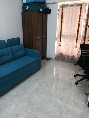 Living Room in 1 BHK Apartment at Lodha Amara, Kolshet Road – for Sale