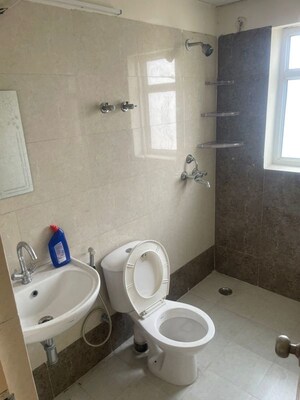 Bathroom in 2 BHK Apartment at MCC Signature Heights, Raj Nagar Extension – for Rent