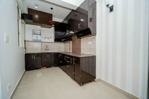 Kitchen in 2 BHK Apartment at Proview Officer City 2, Raj Nagar Extension – for Sale