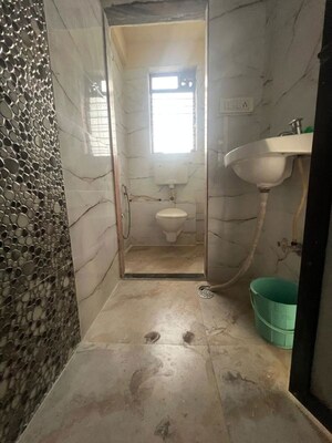 Bathroom in 1 BHK Apartment at Chaitanya Om Rajlaxmi CHS, Kalwa – for Sale