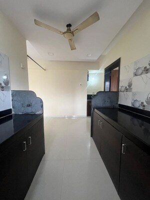 Kitchen in 1 BHK Apartment at Chaitanya Om Rajlaxmi CHS, Kalwa – for Sale