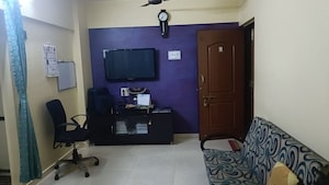 Living Room in 1 BHK Apartment at Bhumiraj Woods, Kharghar – for Sale