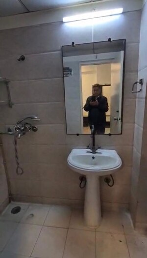 Bathroom in 3 BHK Apartment at Gaur City 1st Avenue, Sector 4 Greater Noida – for Rent