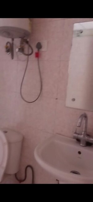 Bathroom in 3 BHK Apartment at Panchsheel Greens II, Sector 16 Greater Noida – for Rent