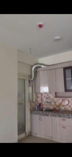 Kitchen in 3 BHK Apartment at Panchsheel Greens II, Sector 16 Greater Noida – for Rent