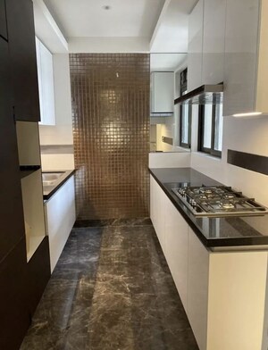 Kitchen in 4 BHK Apartment at Lodha Trump Tower, Worli – for Rent