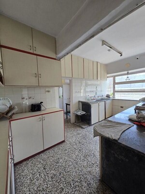 Kitchen in 3 BHK Apartment at Ajanta Apartments Cumbala Hill, Cumbala Hill – for Sale