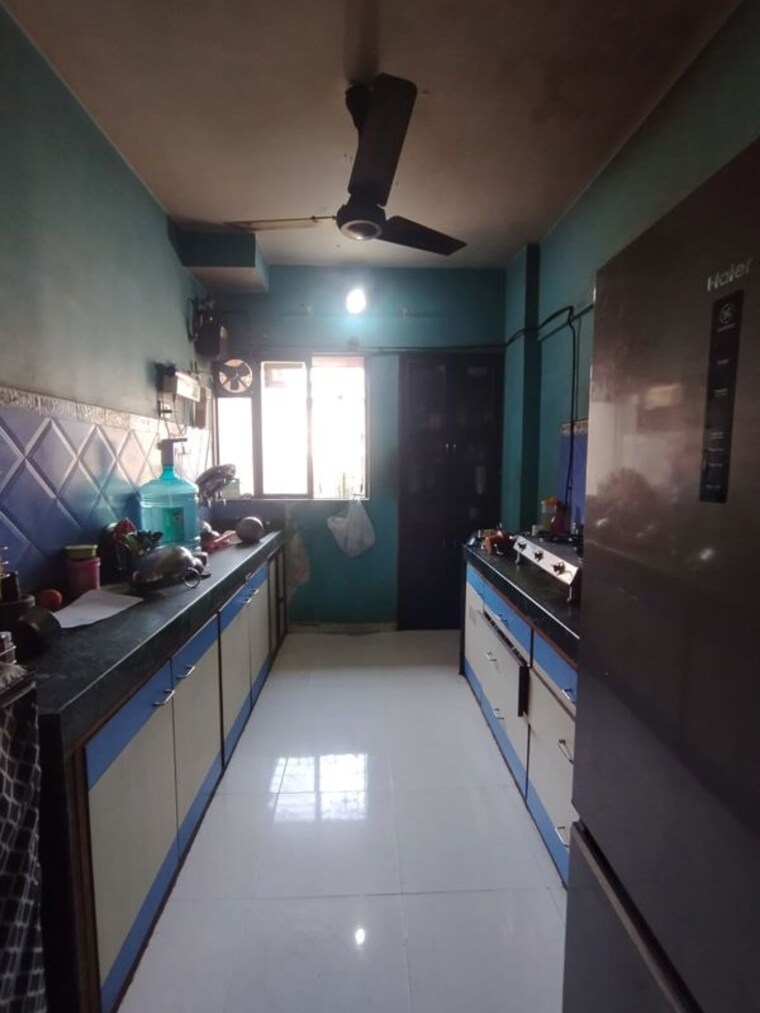 Kitchen, garden-court 2 Bedroom 690 Sq.Ft. Apartment In Waghbil Thane 10305229