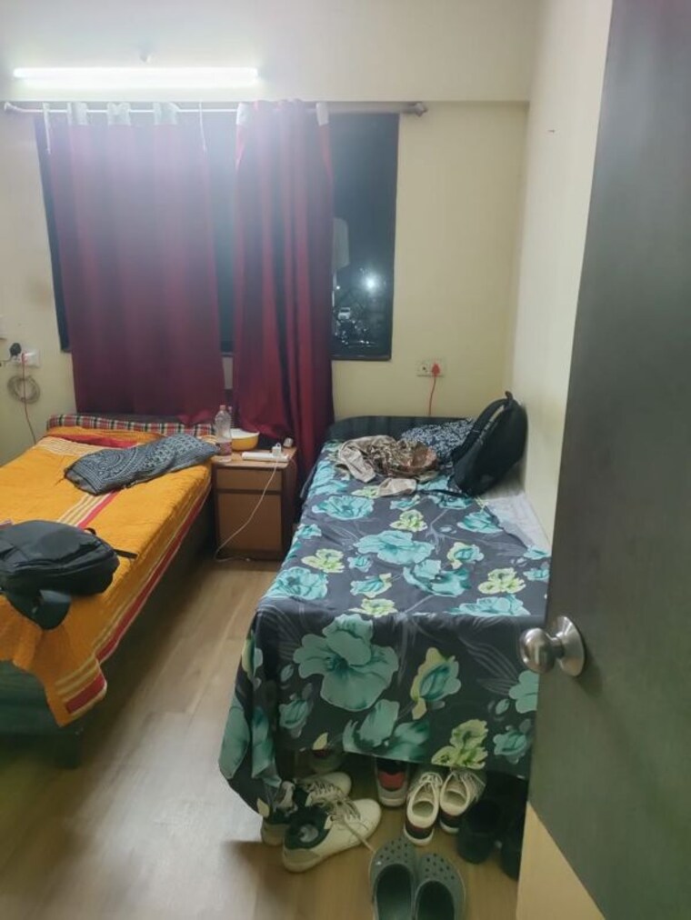 Bedroom, nagri niwara cooperative housing society Pg For Boys & Girls In Nagri Niwara Cooperative Housing Society 10305284