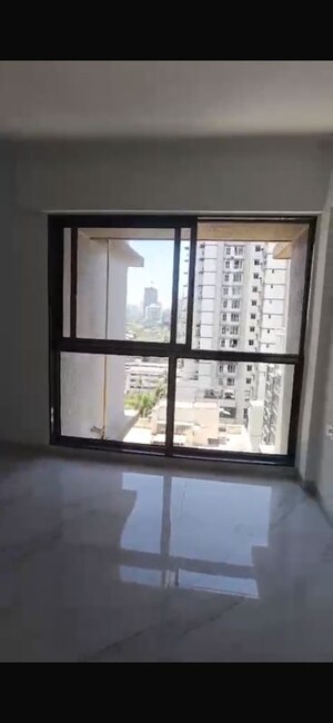 Room in 2 BHK Apartment at Rodium Xline, Kandivali West – for Sale