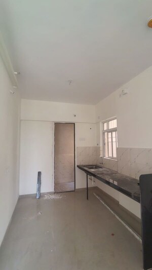Kitchen in 2 BHK Apartment at Kolte Patil Life Republic 16th Avenue Arezo, Hinjewadi – for Rent