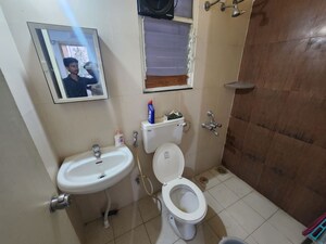 Bathroom in 2 BHK Apartment at Darode Jog Oakwood County, Dhayari – for Rent