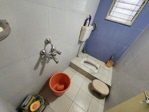 Bathroom in 2 BHK Apartment at Darode Jog Oakwood County, Dhayari – for Rent
