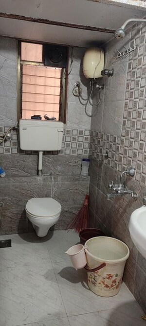 Bathroom in 2 BHK Apartment at Runwal Garden City, Balkum Pada – for Rent