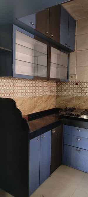 Kitchen in 2 BHK Apartment at Runwal Garden City, Balkum Pada – for Rent