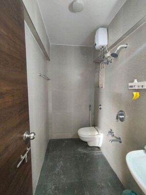Bathroom in 2 BHK Apartment at Cosmos Habitat, Majiwada – for Rent