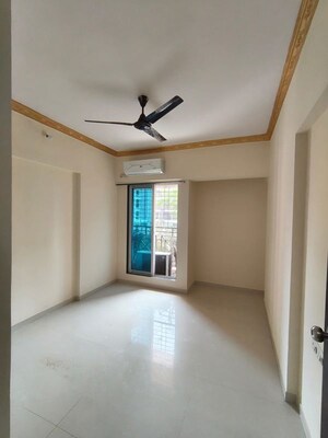 Room in 2 BHK Apartment at Cosmos Habitat, Majiwada – for Rent