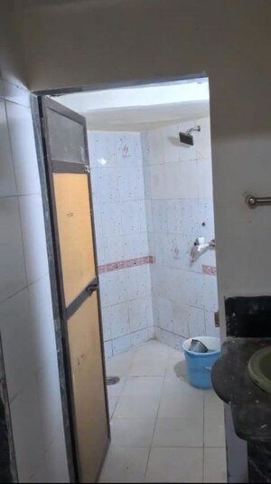 Bathroom in 1 BHK Apartment at Shree Sainath Park CHS, Kasarvadavali – for Rent