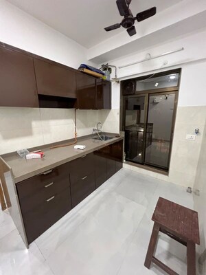 Kitchen in 2 BHK Apartment at Katyayani Enclave, Santacruz East – for Rent