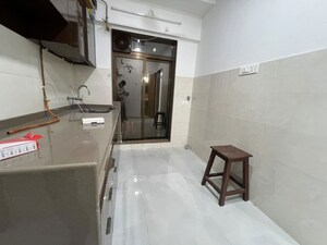 Kitchen in 2 BHK Apartment at Katyayani Enclave, Santacruz East – for Rent