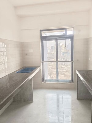 Room in 2 BHK Apartment at IM Applaud 38, Goregaon East – for Rent