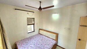 Bedroom in 1 BHK Apartment at Neelam Nagar CHS Mulund, Mulund East – for Sale