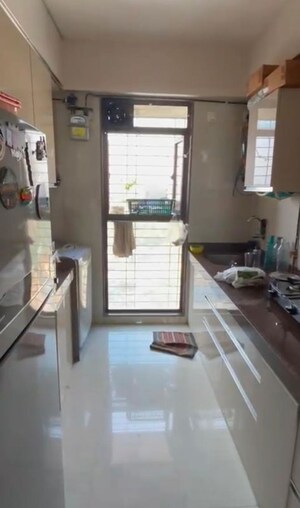 Kitchen in 1 BHK Apartment at Ashray Jaswanti Woods, Mulund West – for Sale