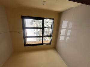 Room in 1.5 BHK Apartment at Atharva Laxmi Narayan Mansion, Borivali East – for Rent