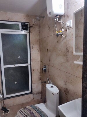Bathroom in 1 BHK Apartment at Juhi Niharika Absolute, Sector 39 Kharghar – for Rent