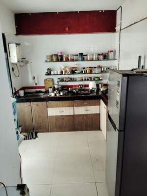 Kitchen in 2 BHK Apartment at Trimurti CHS Kamothe, Kamothe Sector 11 – for Sale