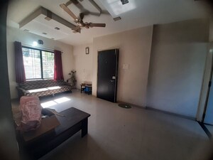 Living Room in 2 BHK Apartment at Savarkar Nagar – for Sale