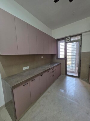 Kitchen in 3 BHK Apartment at T Bhimjyani Neelkanth Woods, Manpada – for Sale
