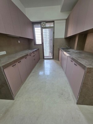 Kitchen in 3 BHK Apartment at T Bhimjyani Neelkanth Woods, Manpada – for Sale